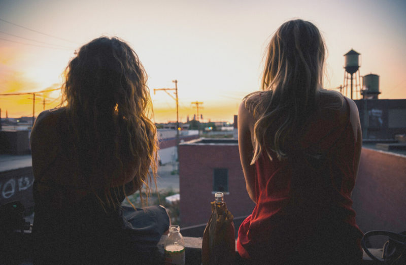Two Women Sunset Drinking Stroh's Beer